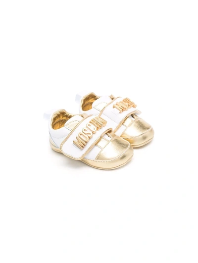 Shop Moschino Logo Strap Sneakers In Gold