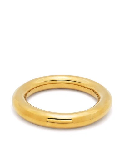 Shop Uncommon Matters Stratus Rounded Bangle In Gold
