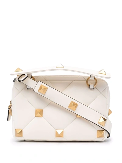 Shop Valentino Roman Stud-embellished Diamond-quilted Clutch Bag In Weiss
