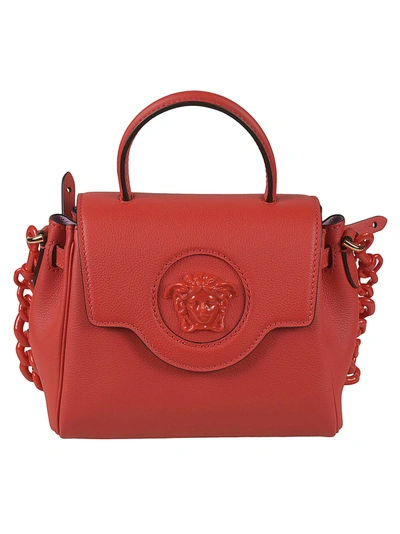 Shop Versace Top Handle Medusa Head Embossed Shoulder Bag In Red