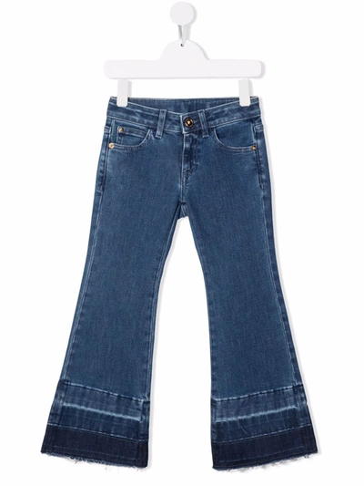 Shop Versace Stonewashed Flared Jeans In Blue
