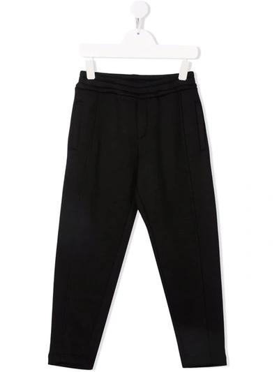 BALMAIN LOGO-PRINT SWEATPANTS 