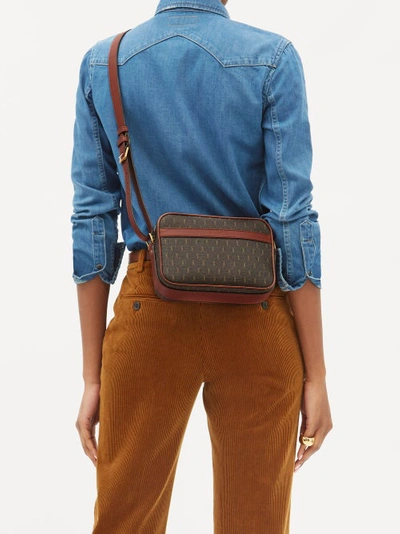 Le Monogramme Canvas And Leather Camera Cross-body Bag In Brown