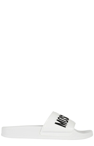 Shop Moschino Logo Embossed Slip In White