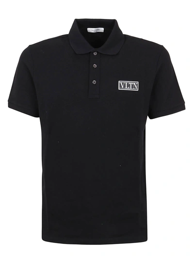 Shop Valentino Logo Embossed Polo Shirt In Black
