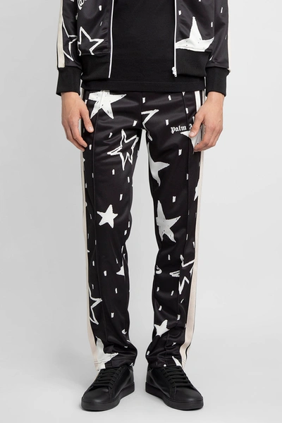 Shop Palm Angels Trousers In Black&white