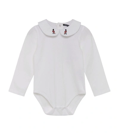 Shop Trotters Embroidered Milo Bodysuit (0-24 Months) In White