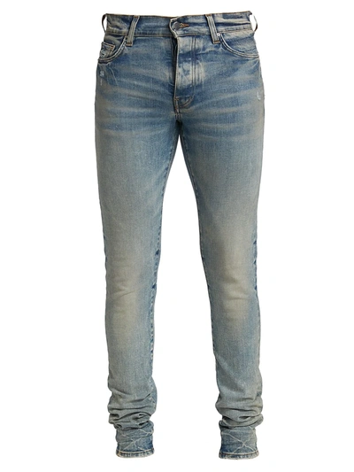 Shop Amiri Stack Light Five-pocket Jeans In Clay Indigo