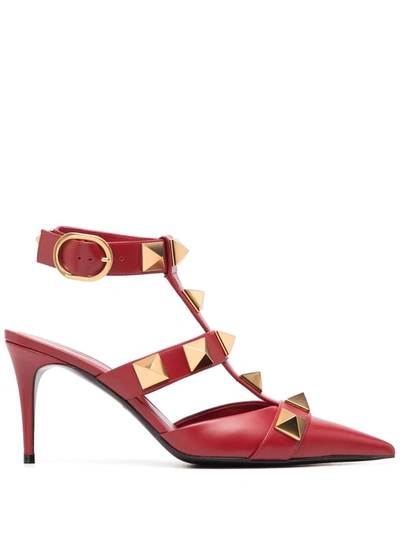 Shop Valentino Roman Stud Buckled Pumps In Rot