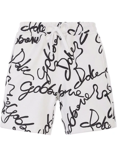 Dolce & Gabbana All-over Logo Print Shorts In White