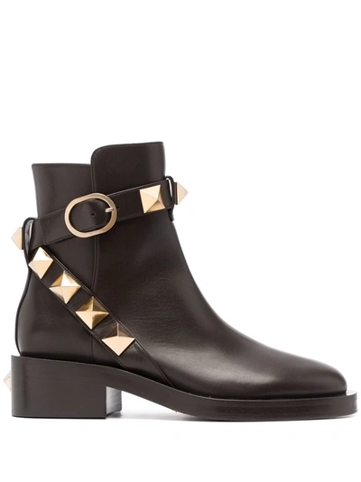 Shop Valentino Roman Stud Leather Ankle Boots In Brown