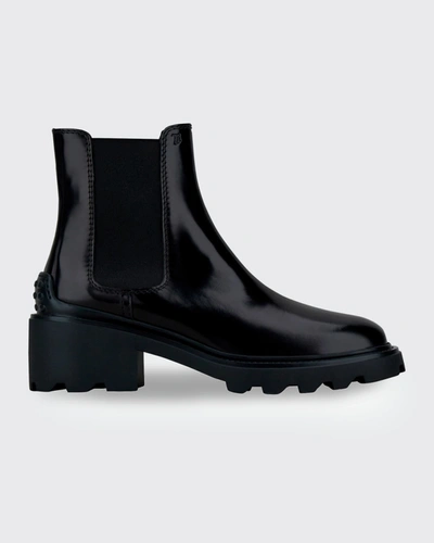 Shop Tod's Shiny Leather Lug-sole Chelsea Boots In Black
