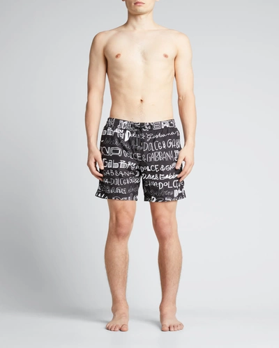 Shop Dolce & Gabbana Men's Multi-logo Swim Shorts In Black Prt