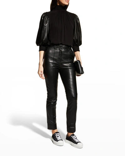 Shop Alice And Olivia Carmina Vegan-leather Smocked Blouse In Black