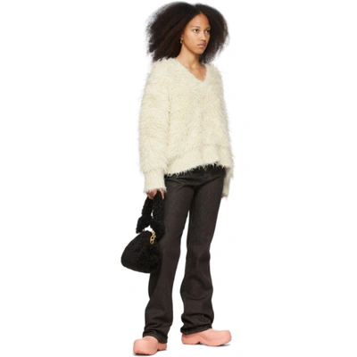 Shop Bottega Veneta Brown Shearling Tip Clutch In 2132 Fondant Gold