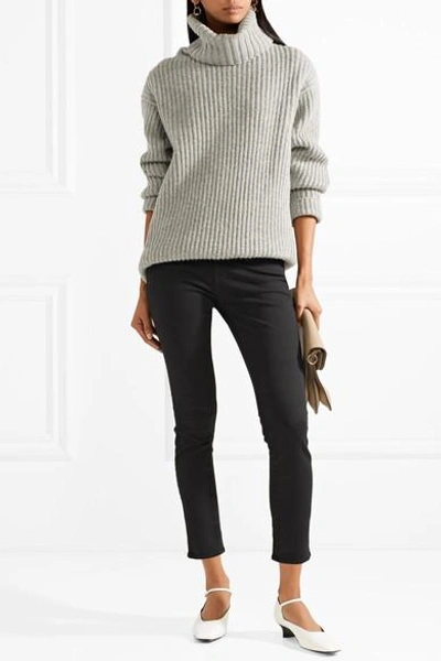 Shop Frame Le Color Cropped Mid-rise Skinny Jeans In Black