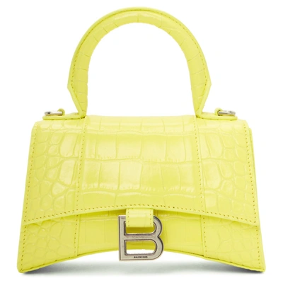 Pastel yellow croc-effect baguette bag
