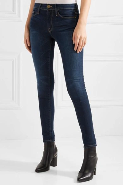 Shop Frame Le Skinny De Jeanne Mid-rise Jeans In Mid Denim