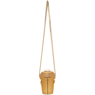 Shop Moschino Gold Trash Can Shoulder Bag In A0606 Shiny Gold