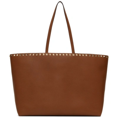 Shop Valentino Brown Rockstud Tote In Hg5 Selleria