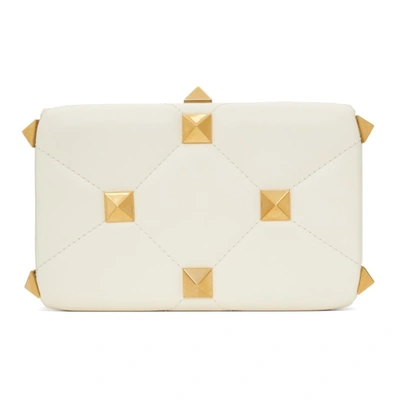 Shop Valentino Off-white Roman Stud Clutch In 098 Ivory