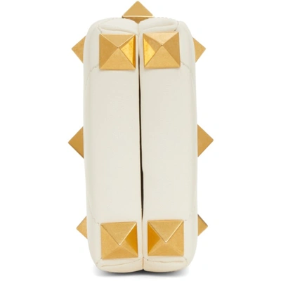 Shop Valentino Off-white Roman Stud Clutch In 098 Ivory