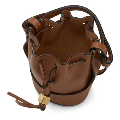 LOEWE - The Balloon bag in black and tan pre-launches exclusively