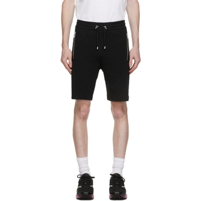 Shop Balmain Black Embossed Logo Shorts In 0pa Noir