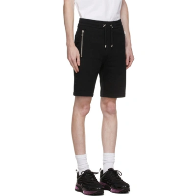 Shop Balmain Black Embossed Logo Shorts In 0pa Noir