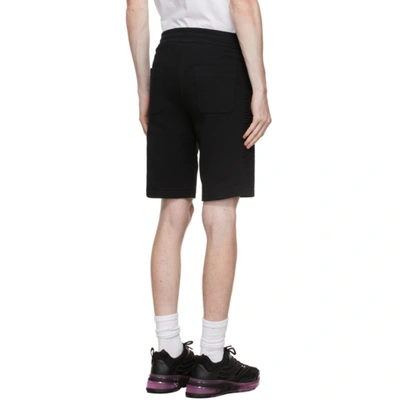 Shop Balmain Black Embossed Logo Shorts In 0pa Noir