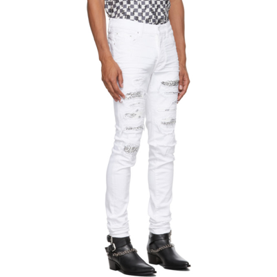 Shop Amiri White Bandana Thrasher Jeans