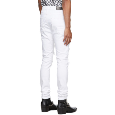 Shop Amiri White Bandana Thrasher Jeans