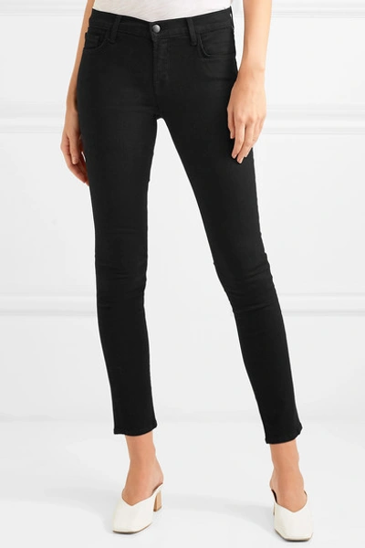 Shop J Brand 811 Photo Ready Mid-rise Skinny Jeans In Black