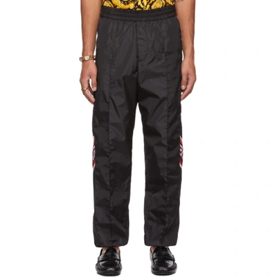 Shop Versace Black Taffeta Greca Lounge Pants In 6b120 Black