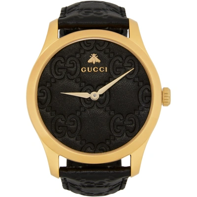 Shop Gucci Gold & Black Embossed G-timeless Watch In Black/gold