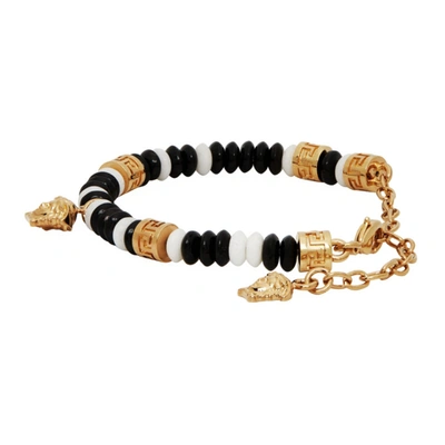 Shop Versace Black & White Beaded Medusa Charm Bracelet In Dwnov White/black