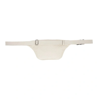 Shop Gucci Off-white Gg Embossed Belt Bag In 9022 M.white/m.white