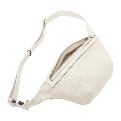 Shop Gucci Off-white Gg Embossed Belt Bag In 9022 M.white/m.white