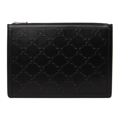 Shop Gucci Black Gg Embossed Pouch In 1000 Black/black