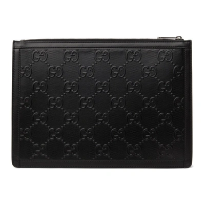 Shop Gucci Black Gg Embossed Pouch In 1000 Black/black