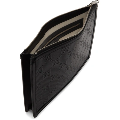 Shop Gucci Black Gg Embossed Pouch In 1000 Black/black