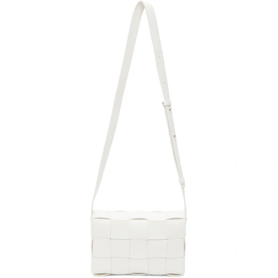 Shop Bottega Veneta White Cassette Crossbody Bag In 9007 White Silver