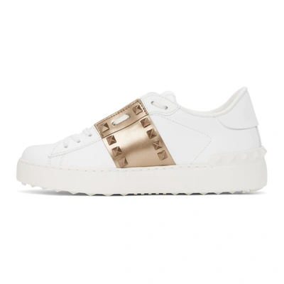 Shop Valentino White & Bronze Rockstud Open Sneakers In 155 White/skin