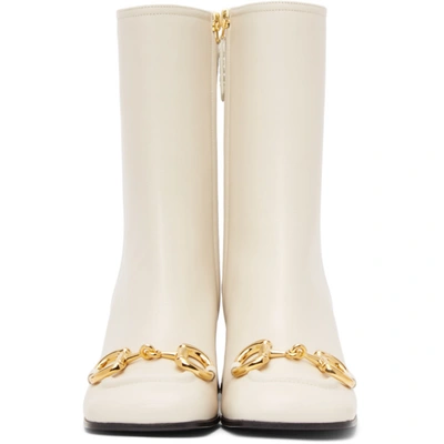 Shop Gucci Off-white Horsebit Mid Heel Ankle Boots In 9022 White