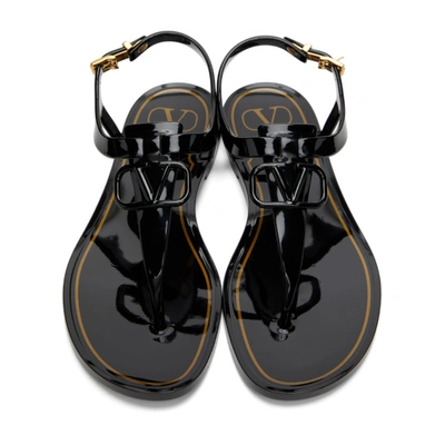Shop Valentino Black  Garavani Rubber Vlogo Flat Sandals In 0no Black