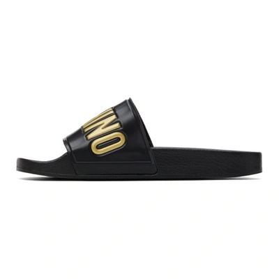 Shop Moschino Black & Gold Logo Slide Sandals In 00a Fantasycolor