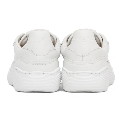 Shop Alaïa White Calfskin Wave Sneakers In 020 Blanc Casse