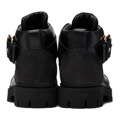 Shop Moschino Black Buckle Logo Boots In 00a Fantasycolor