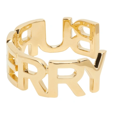Shop Burberry Gold Logo Cuff Bracelet In Light Gold