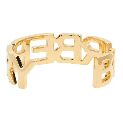 Shop Burberry Gold Logo Cuff Bracelet In Light Gold